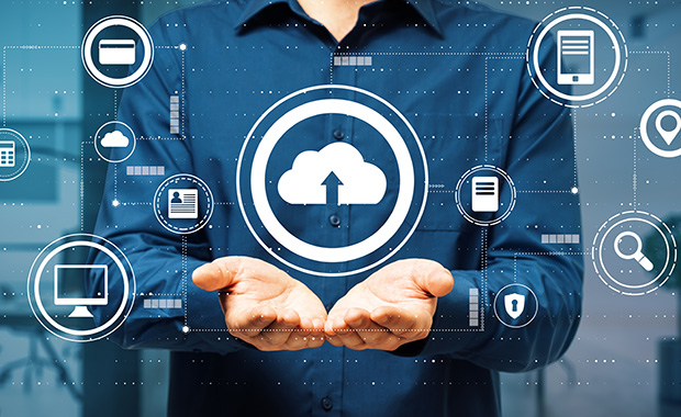 Photo illustration with virtual cloud service icons over open pair of hands