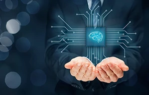 A person in a suit holding a glowing digital brain icon connected to circuit lines.