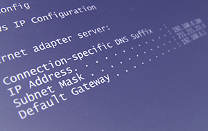 Blue computer screen with white text showing IP address