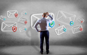 A man stands scratching his head while looking at floating email icons marked with check and cross symbols.