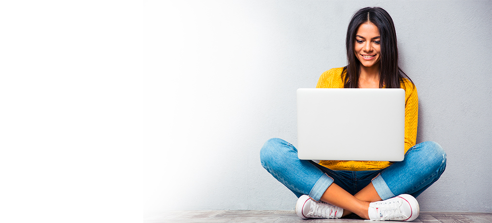 Laughing women with laptop