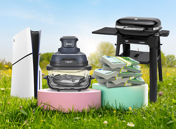 Konsole, Mixer und Grill auf Podesten im Blumenfeld, daneben Geldstapel