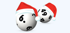 Lottokugeln mit Weihnachtsmütze